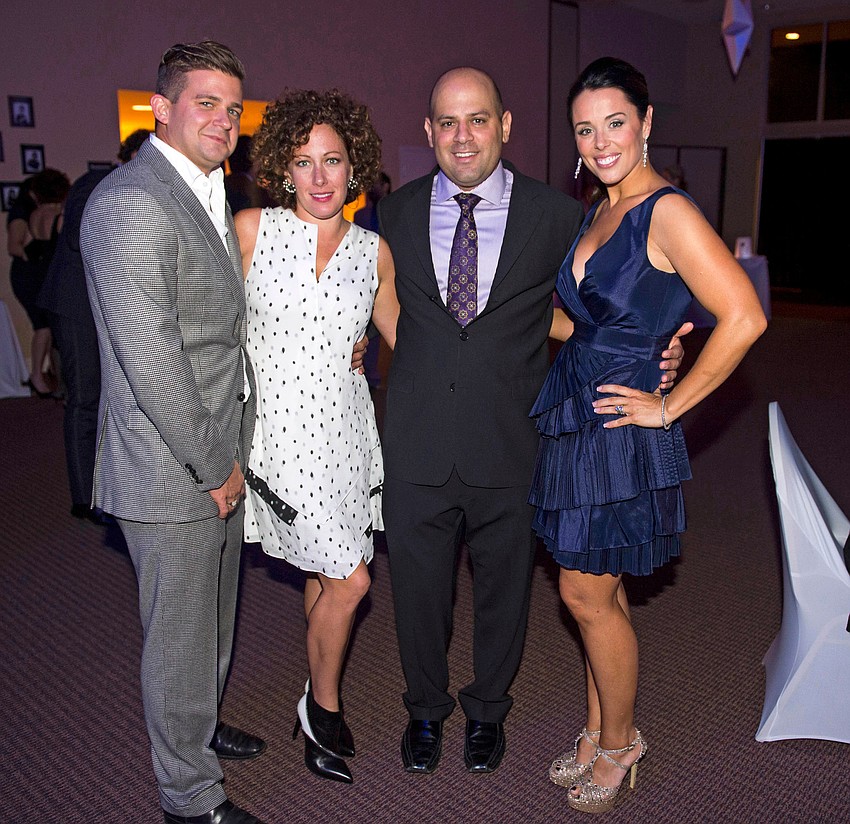 Wayne and Mindy Rollins with Dr. Scott and Kelly Engel