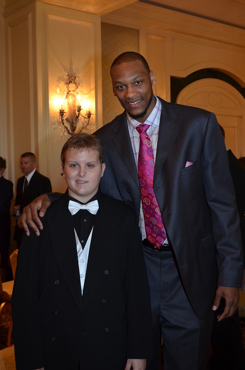 Dillon Simmons with Michigan State basketball player Adreian Payne