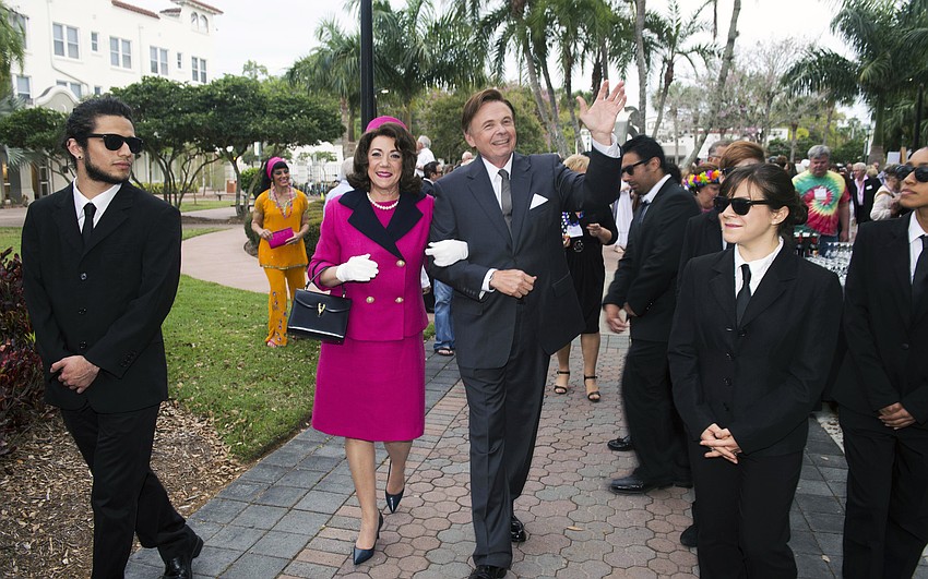Pat and Dr. Larry Thompson make their arrival as the Kennedys