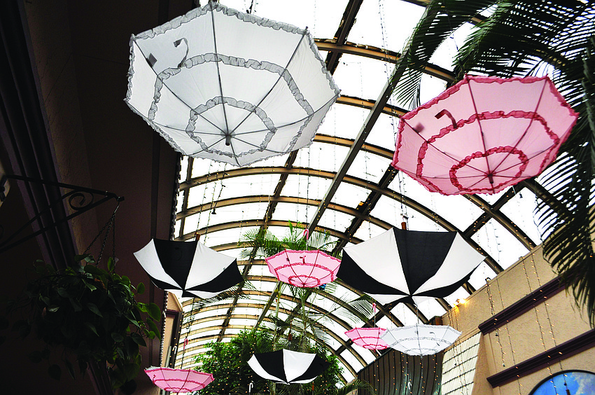 Pink, white and black parasols hung from the roof of Michael's On East at the Children First Gala 