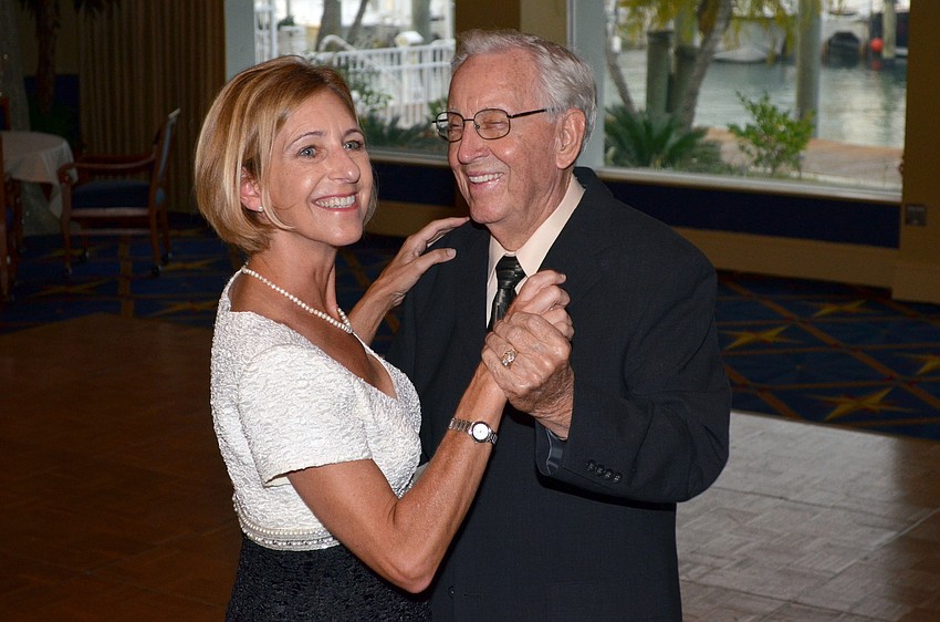 Stacy Ridenour and Leonard Mullins dance to the sounds of the Joe Scarano Trio at â€˜A Winter Soiree.â€™