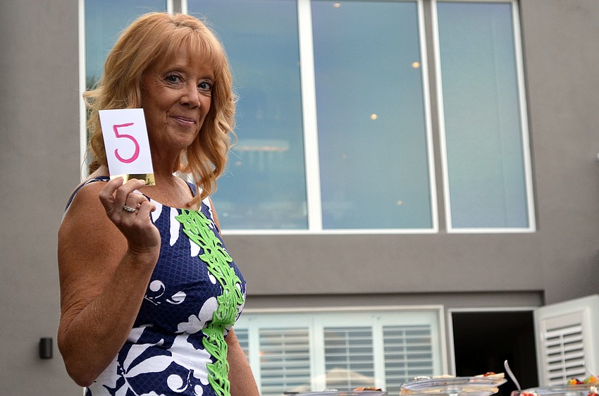 Models fashioned in the latest looks by Lilly Pulitzer walked the runway at the Lilly Pulitzer High Tea & Champagne Fashion Show.