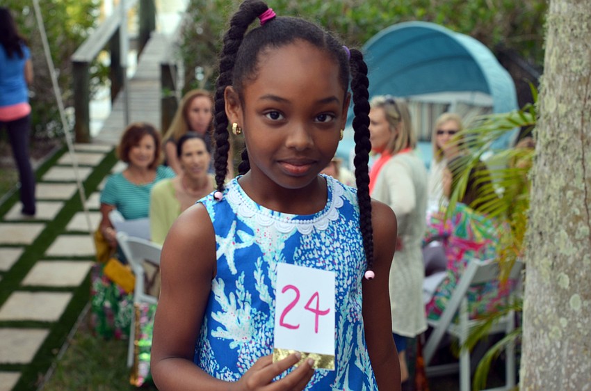 Models fashioned in the latest looks by Lilly Pulitzer walked the runway at the Lilly Pulitzer High Tea & Champagne Fashion Show.