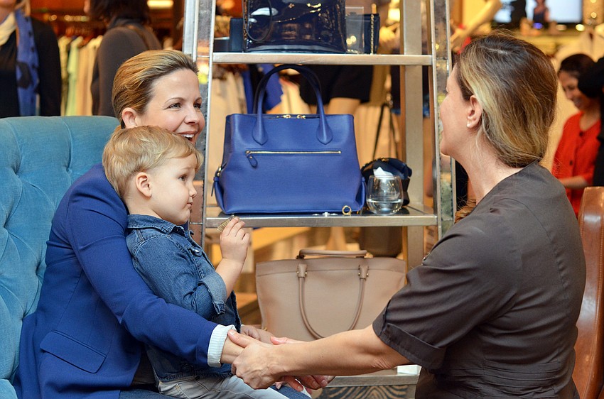 Guests received free hand massages at the Spring Trends Event.