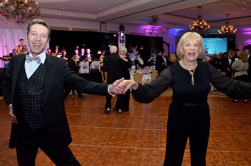 Jim Helmich and Gloria Moss dance to Michael Andrew & The Atomic Big Band
