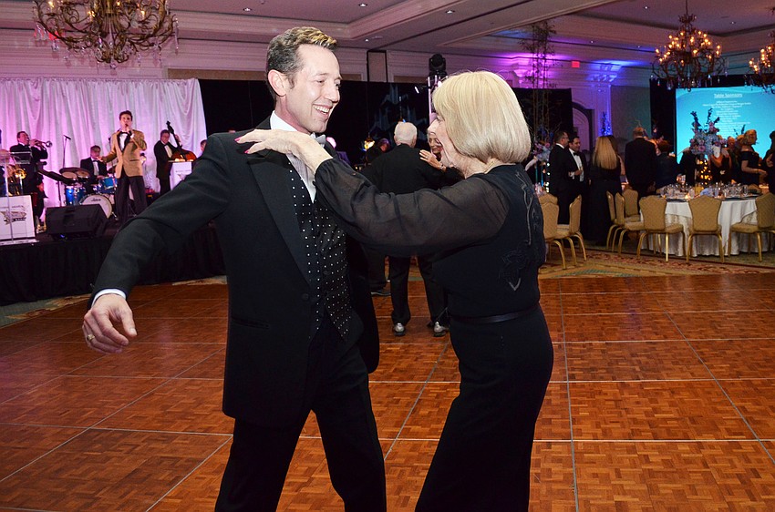 Jim Helmich and Gloria Moss dance to Michael Andrew & The Atomic Big Band