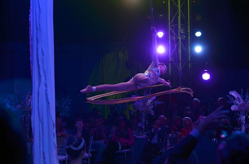 Following the dinner catered by Michaelâ€™s On East, guests enjoyed thrilling circus entertainment at the 2015 Circus Arts Gala.