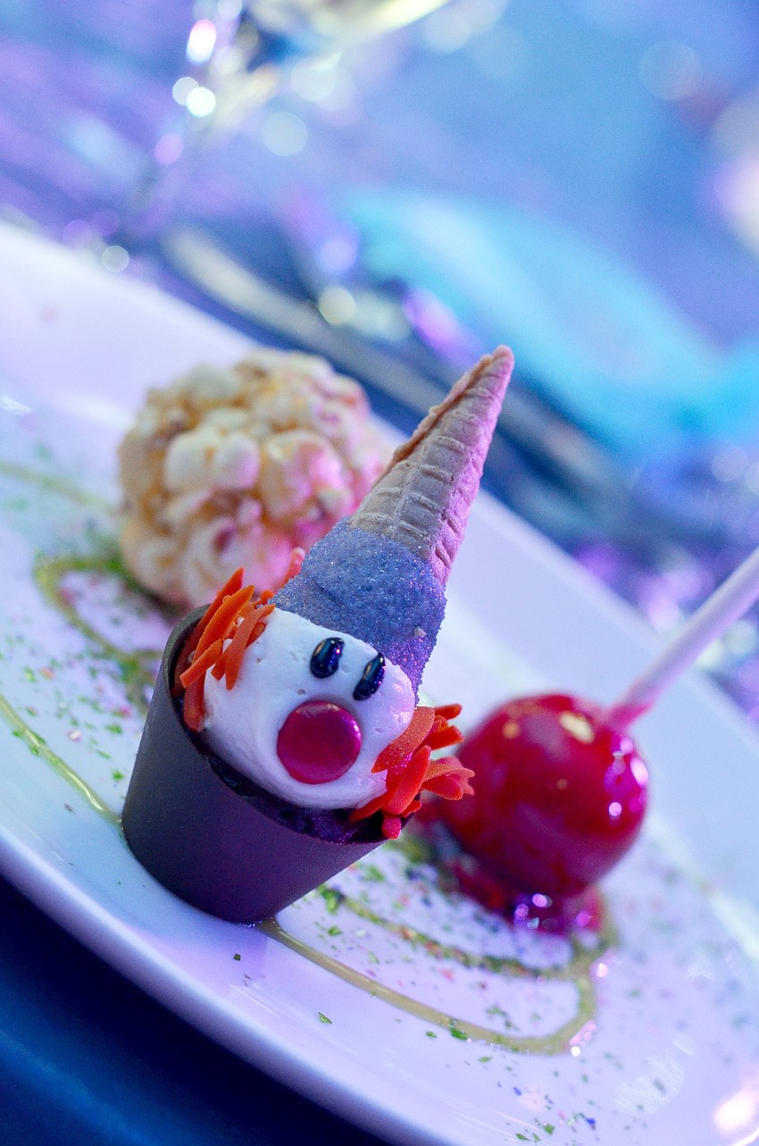 A trio of circus desserts including an upside down clown hat filled with chocolate mousse, a mini candied apple and a popcorn ball were served to guests at the 2015 Circus Arts Gala, as a tribute to Tana Sandefurâ€™s sweet tooth.