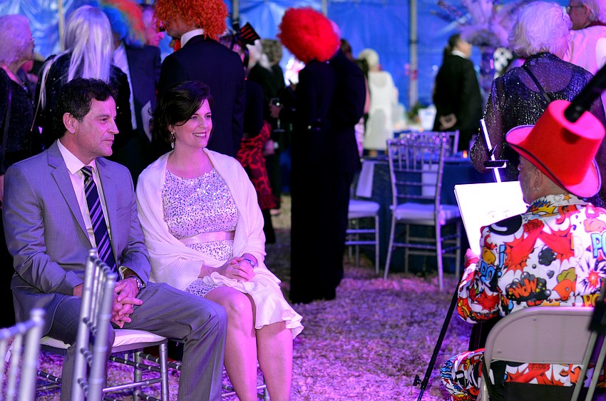 Bart and Kameron Hodges get a caricature drawn at the 2015 Circus Gala.