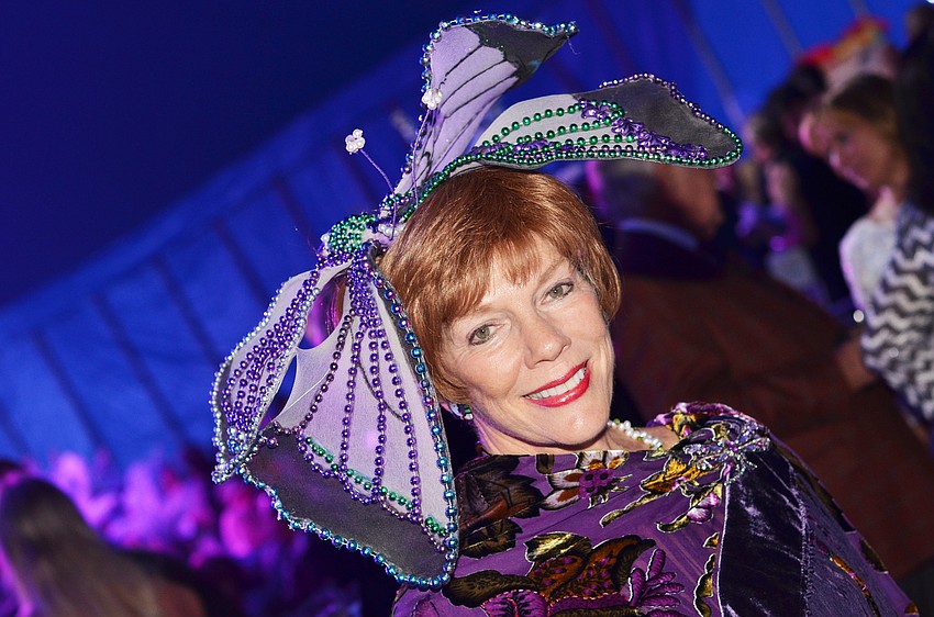 Barb Tye donning a custom butterfly headpiece at the 2015 Circus Arts Gala.