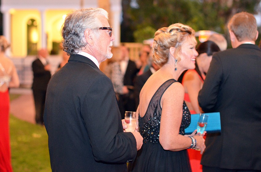 Guests are welcomed by the Co-Chairs upon arriving at The Palm Ball â€˜A Passion for Conservation.â€™