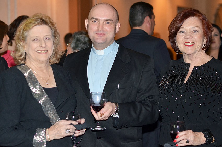 Pat Riley, The Rev. Peter Zugaj and Marilyn Maleckas