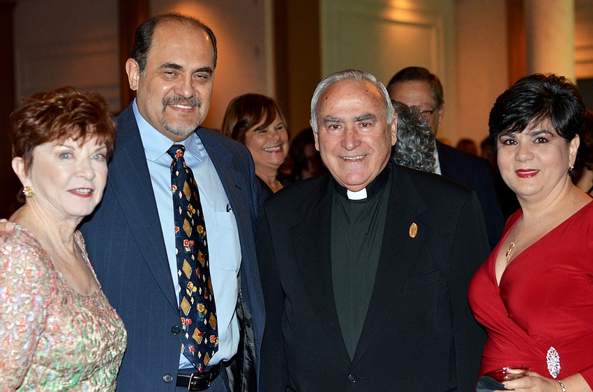 Chairwoman Kathy Schersten, Luis Gutierrez, Fr. Celestino Gutierrez and Marybel Gutierrez