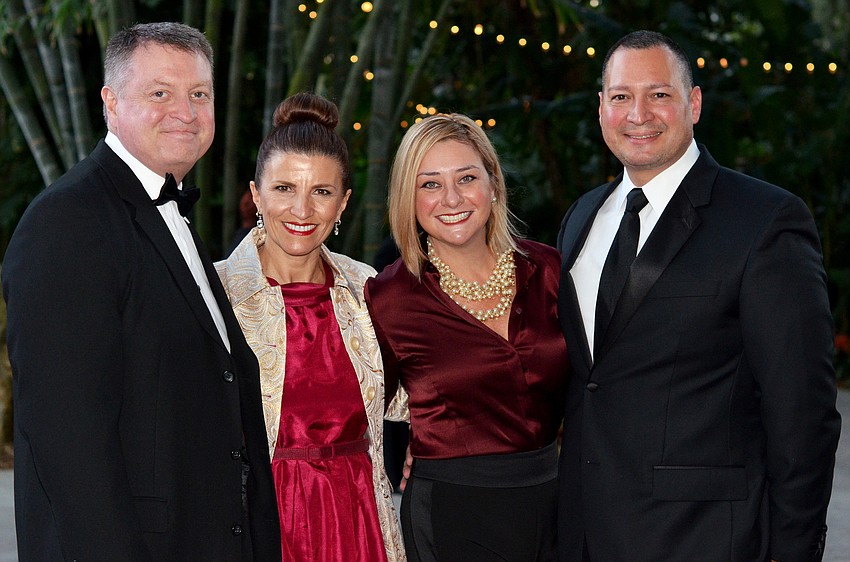 Mark and Violeta Huesman with Jessica and Tav Ortiz