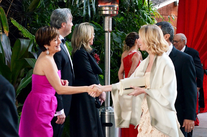 Orchid Ball Co-Chairs and Marie Selby Botanical Gardens board members welcome guests to the 2015 Orchid Ball