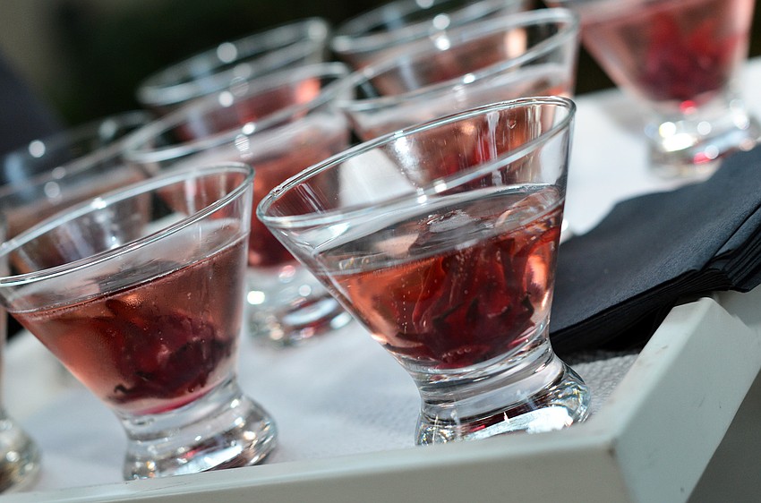 The signature cocktail was champagne with an edible hibiscus.