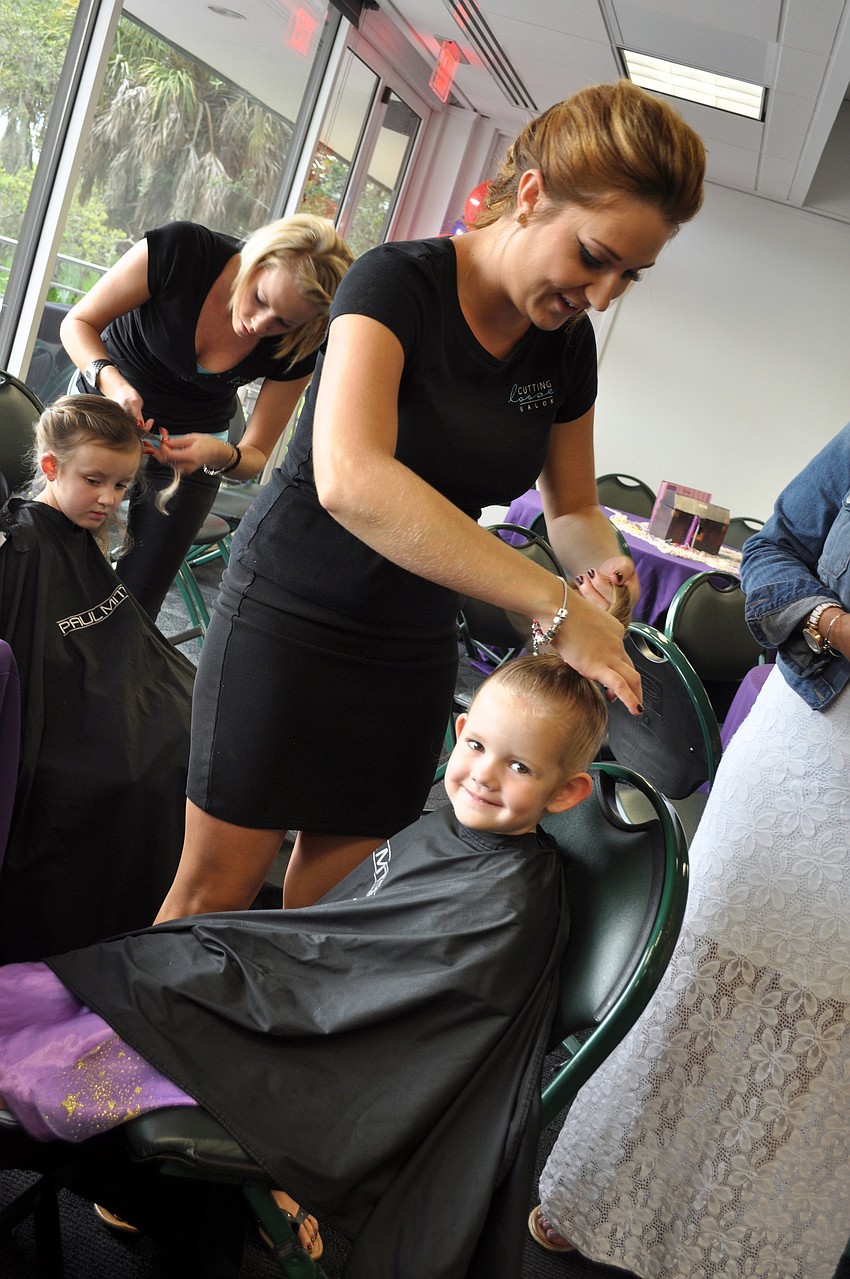 Kasey Gaskill from Cutting Loose Salon does Ava Haysâ€™s hair for the ball.