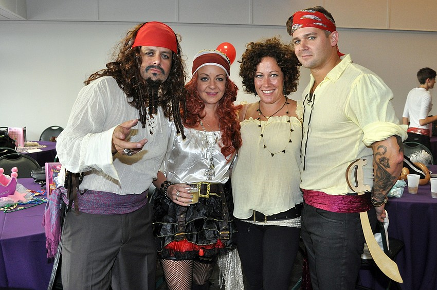 Brooke and Karen Misantone with Mindy and Wayne Rollins