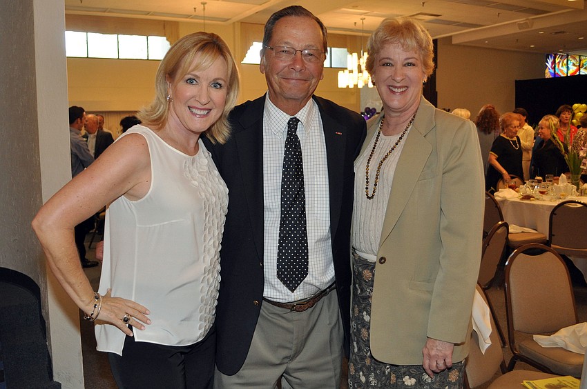Teri Hansen and Steve Wilberding with Anne Garlington