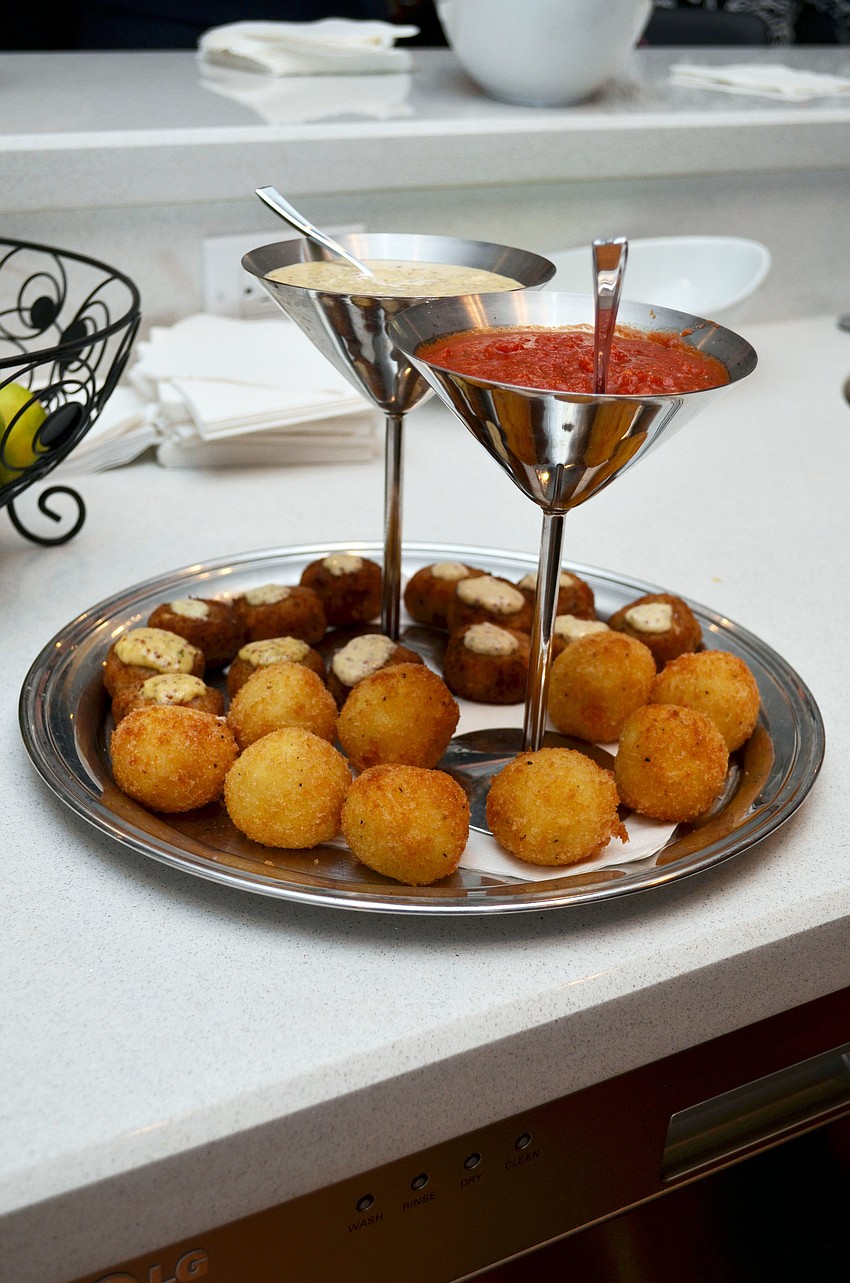 Guests enjoyed cocktails and hors dâ€™oeuvres catered by Mortonâ€™s.