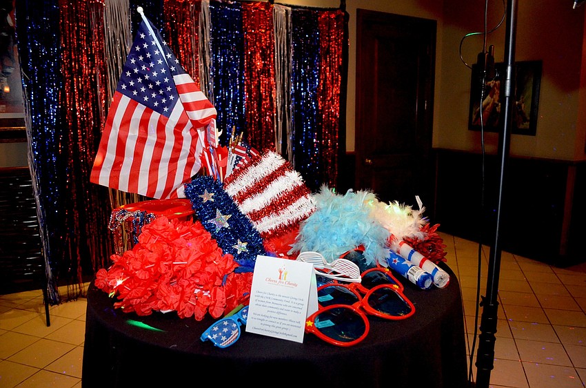 The event featured a photo booth with patriotic props.