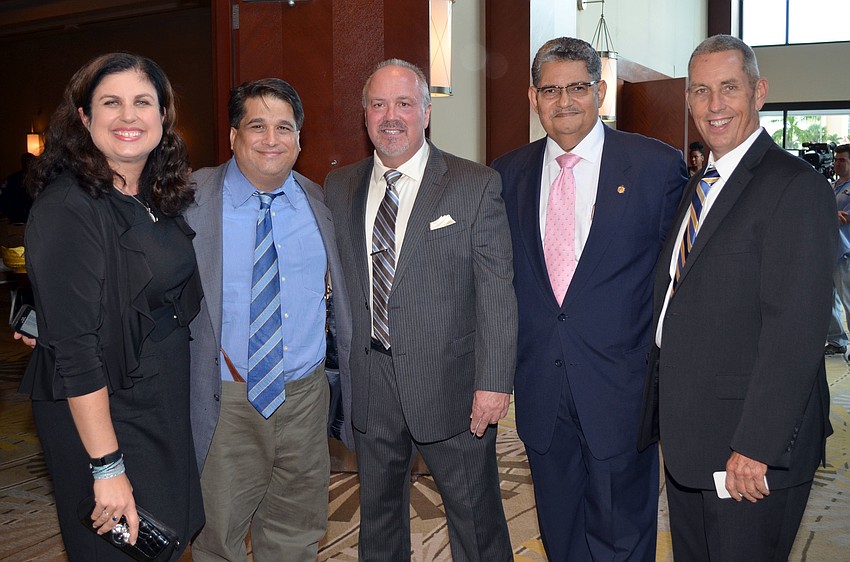 County Commissioner Christine and Eric Robinson, Steve Burns, John Colon and Bill Spitler