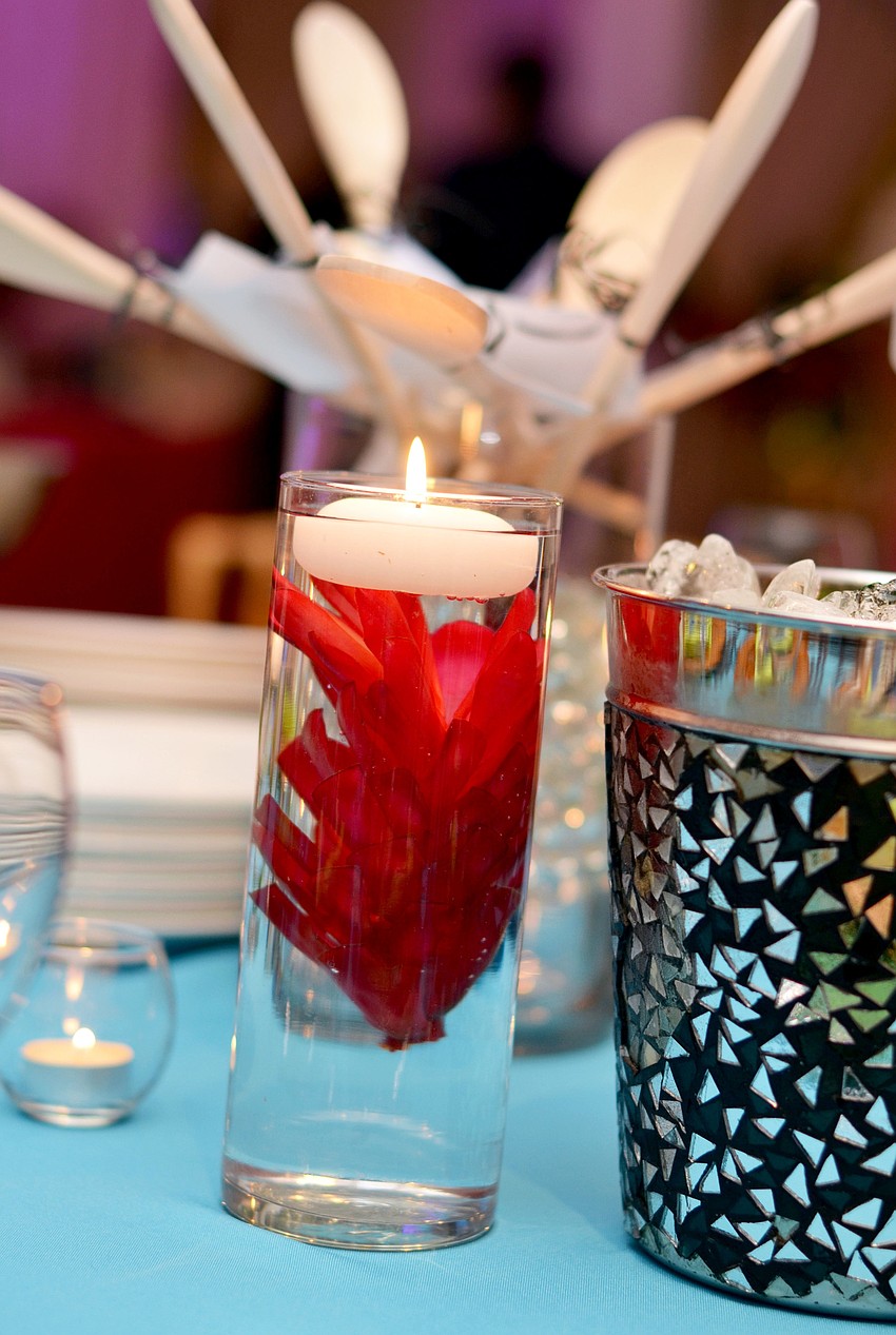 The tables at Michaelâ€™s On East were decorated with a Caribbean theme for St. Martha Catholic Schoolâ€™s 4th annual Interactive Dinner.