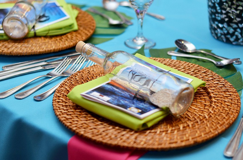 The tables at Michaelâ€™s On East were decorated with a Caribbean theme for St. Martha Catholic Schoolâ€™s 4th annual Interactive Dinner.