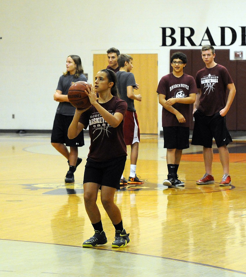 Mackenzie Ramalho attempts a shot during the 3-point shooting competition.