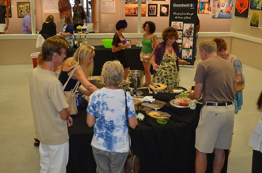 Art lovers enjoying a mashed potato bar at the Art Center Sarasota's 
