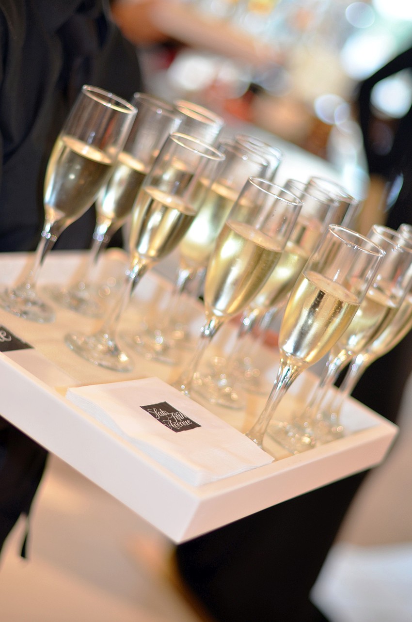 Guests were given champagne as they arrived at Key to the Cure.