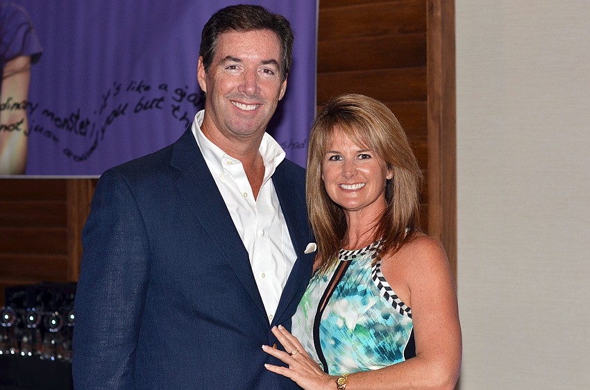 Emcee Ray Collins and Erin Lazo