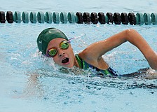 Nine-year-old Abby Loefgren won her heat of the 100-yard freestyle.