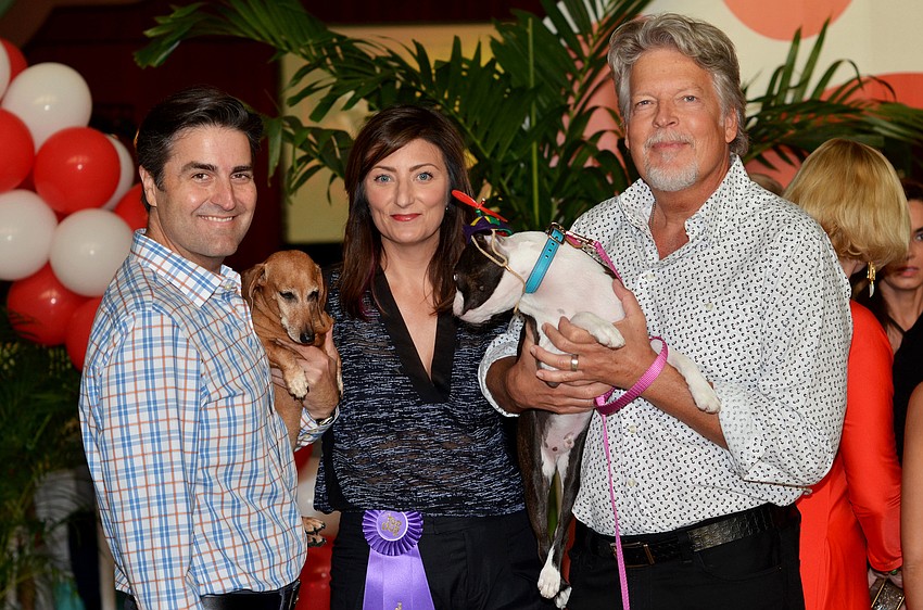 Tom Luzier with Lulu, Heather Dunhill and Ted Meekma with Carlos