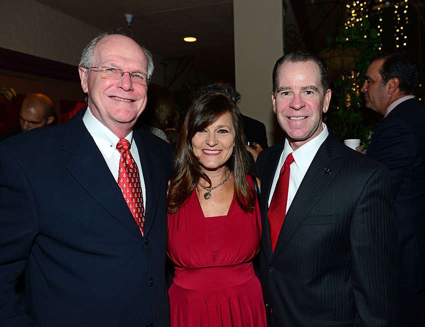 Dr. Richard Van Buskirk with Wendy and Shaun Merriman