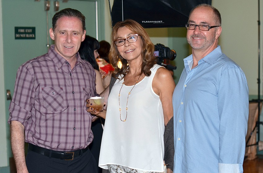 Dr. Howard Small with Chris and Kirk Voelker