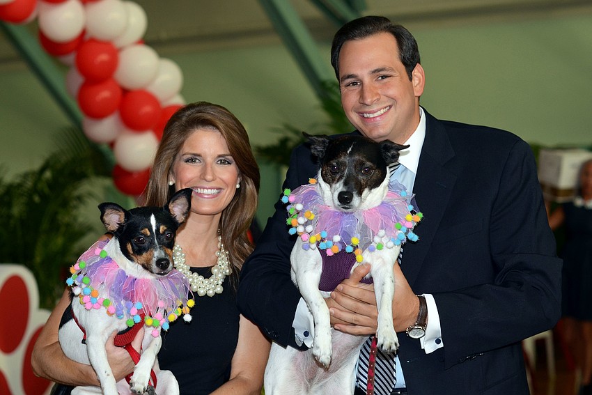 Hayley Wielgus and Max Winitz with their dogs at Donteâ€™s Den Top Dog 2014