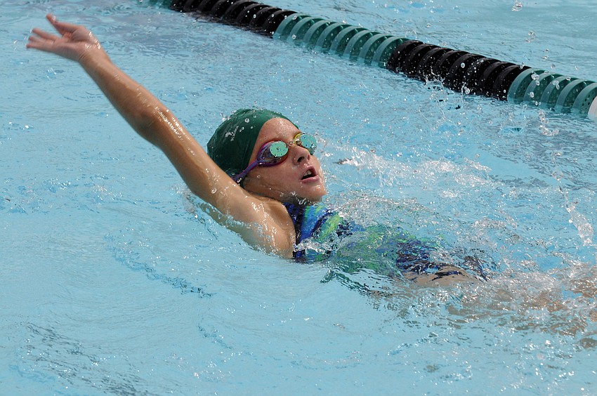 Abby Loefgren swam the 100-year freestyle and the 100 IM.
