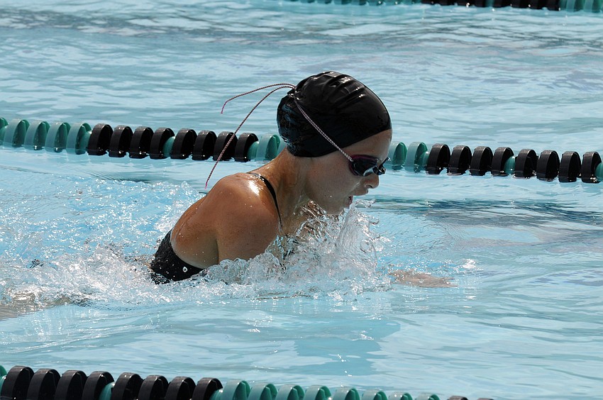 Phoebe Duval swims the breaststroke leg of the 100-yard individual medley.