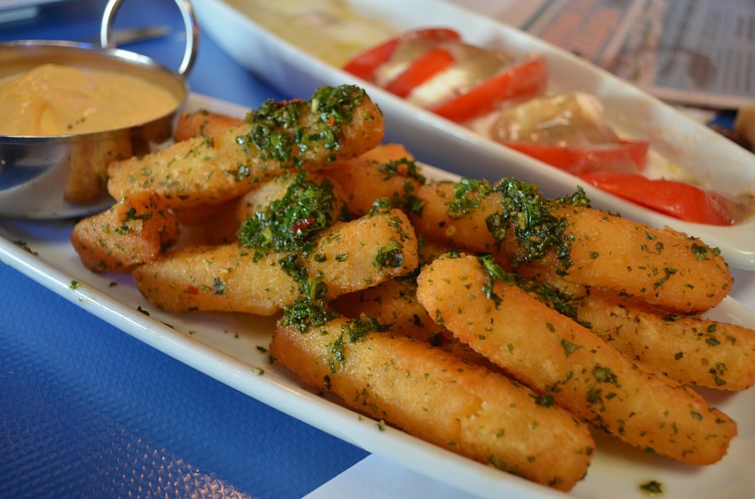 Yucca fries with cheese sauce at Phillippi Creek Village Restaurant