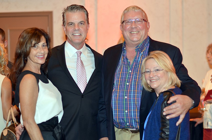 Jeanne Medawar and Brad Hogreye with Ron and Shari Jansen