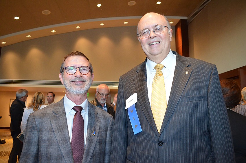 Goodwill Industries of Sarasota President and CEO, Bob Rosinsky and honoree Cliff Walters