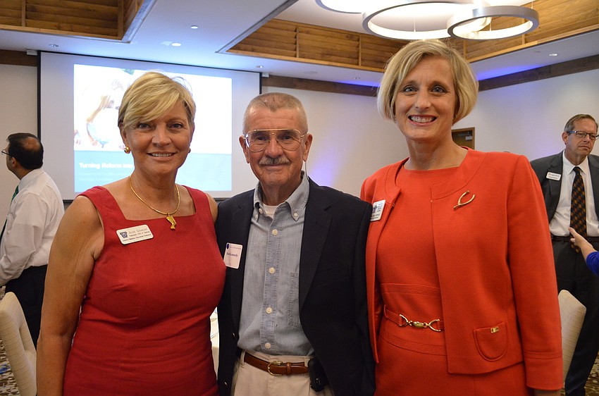 Sarasota Memorial Healthcare Foundation President & CEO Alex Quarles, Dan Kennedy and Jodi Kopacz.