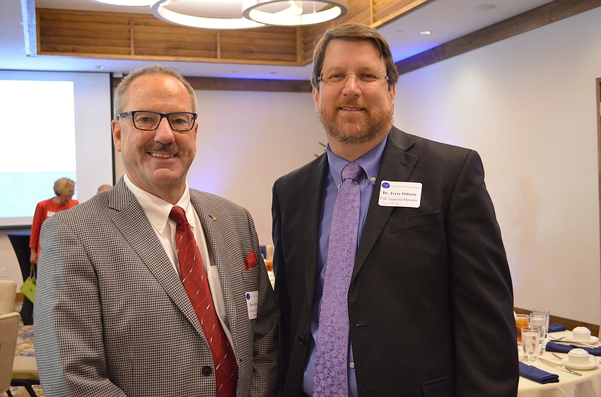 Greater Sarasota Chamber of Commerce President and CEO Steve Queior and University of South Florida Regional Vice Chancellor Terry Osborn.