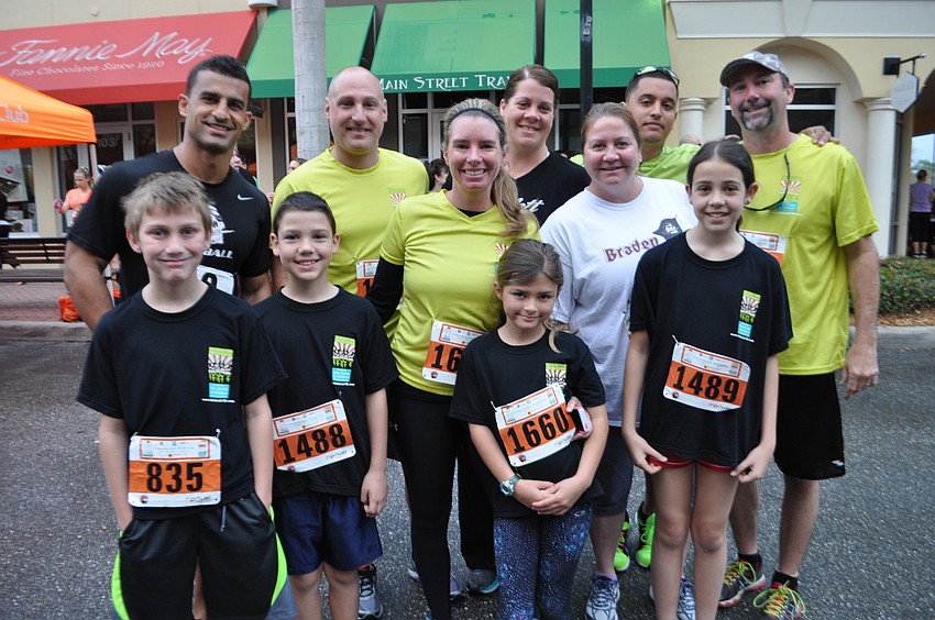 Pictured clockwise from bottom left are: J.D. Delesline, Curt Bradley, Joe Novarro, Tracey Rosa, Erin Navarro, Monica Delesline, Carlo Rodriguez, John Delesline, Ella Novarro, Haley Rose and Matthew Novarro.