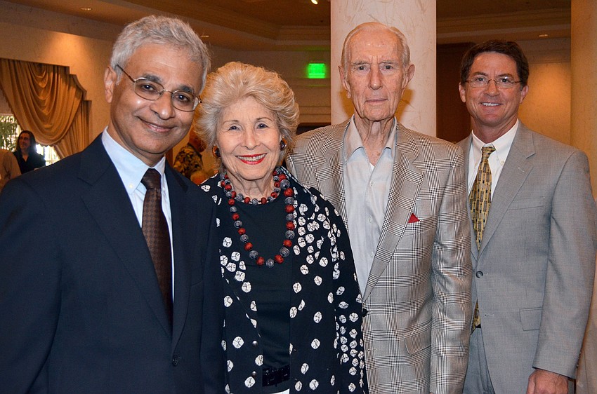 Featured speaker Aaron Jacob, Carol and Mort Siegler and Brad Robbins