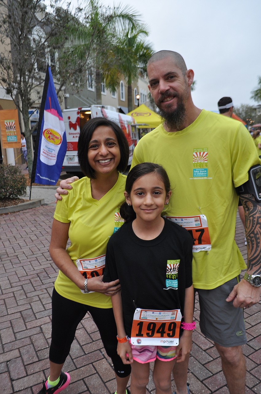 Vaishalee and Josh Wilson join their daughter, Priya, for her first official 5K race.
