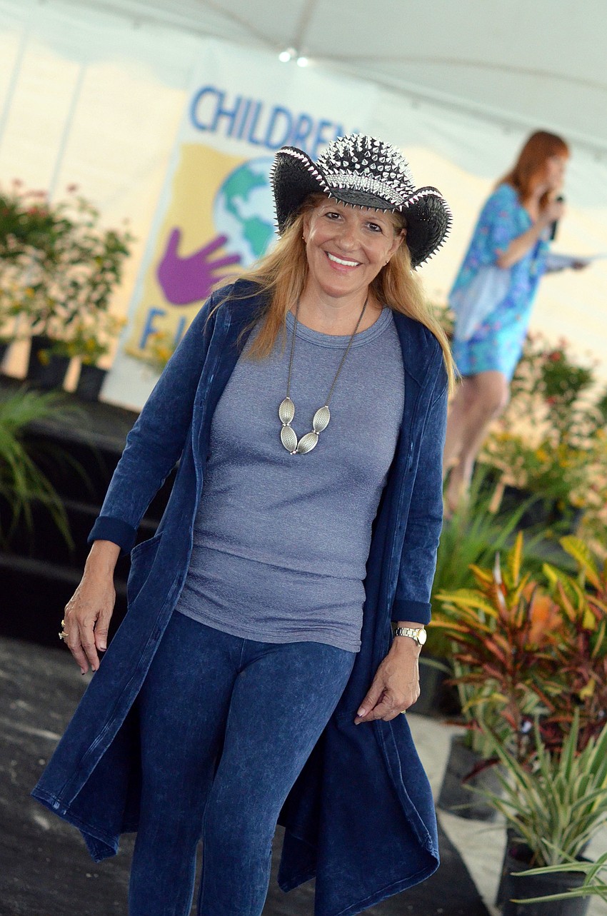 Models wore fashions by KapriCouture, L. Boutique and SunBug in the Flip Flops and Fashion luncheon and fashion show.