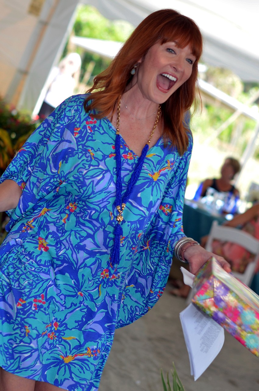 Fashion show emcee Emily Walsh