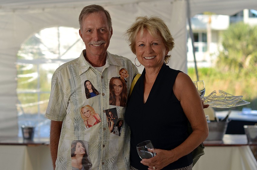Scott, dressed as a â€œChick Magnet,â€ and Kathy Hase